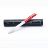 Tesla-branded red and white pen with black case